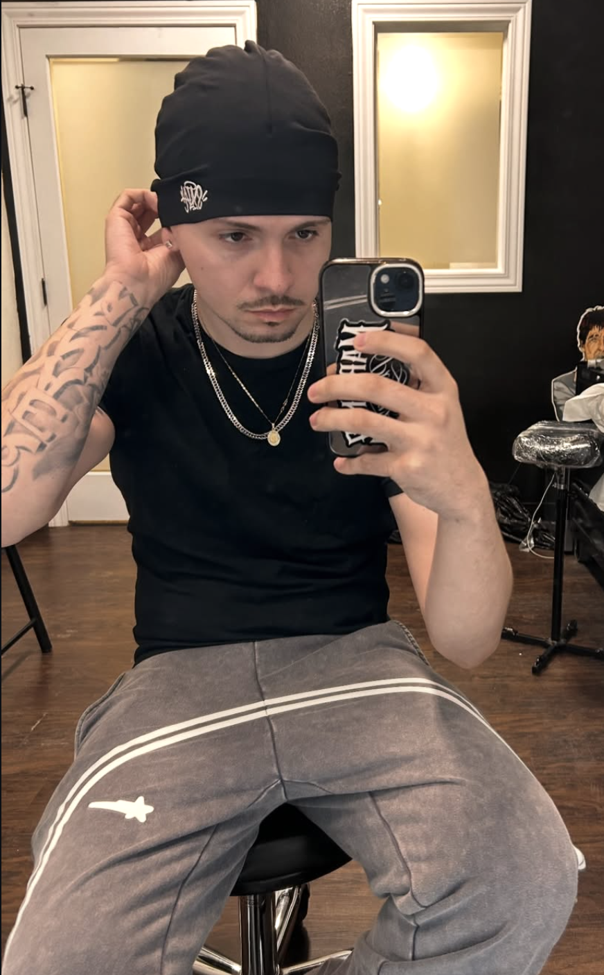 Tattoo artist Martinez Placaz in his West Des Moines studio